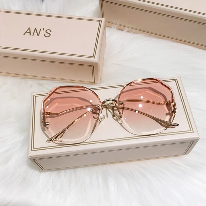 2021 New Women Sunglasses Rimless UV400 Bennys Beauty World