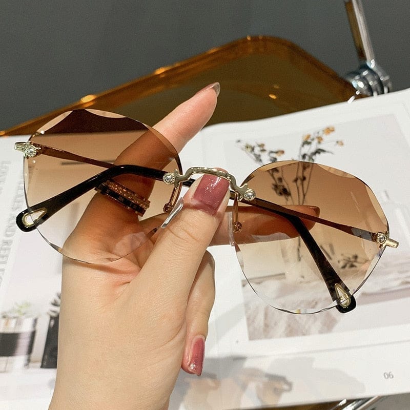 Rimless best sale round sunglasses