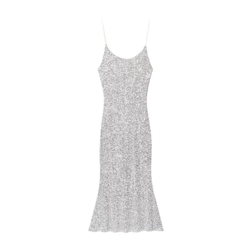 Silver sequin dress on a white background