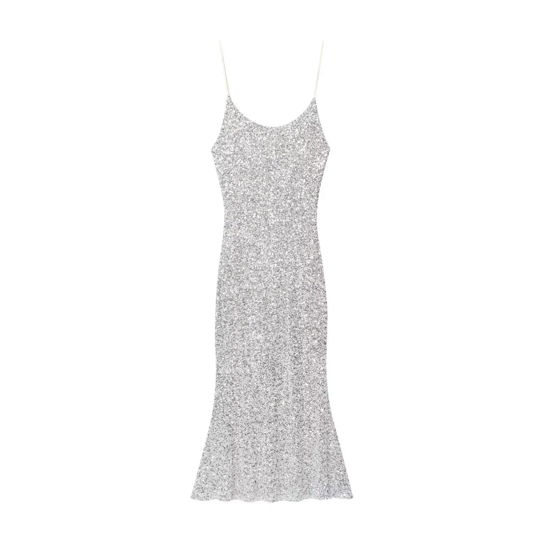Silver sequin dress on a white background